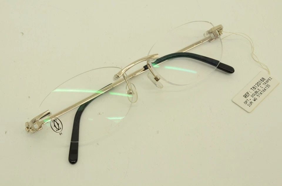AUTHENTIC CARTIER RIMLESS EYEGLASSES 51 16 135 TRAPEZ 18K WG CRT8120168 FRAMES: AUTHENTIC CARTIER RIMLESS EYEGLASSES 51 16 135 TRAPEZ 18K WG CRT8120168 FRAMES Authentic Cartier Rimless Eyeglasses 51 16 135 Trapez 18k WG CRT8120168 Frames Authentic Cartier Rimless Eyeglasses 51 16
