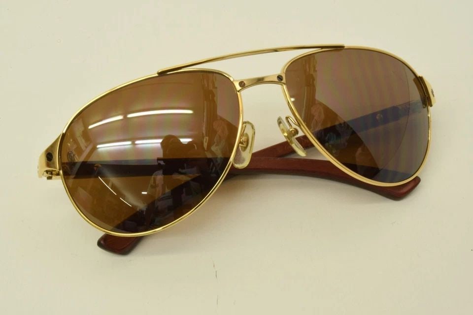 AUTHENTIC CARTIER SANTOS DUMONT WOOD SUNGLASSES 61 16 130B GP EDITION FRAMES: AUTHENTIC CARTIER SANTOS DUMONT WOOD SUNGLASSES 61 16 130B GP EDITION FRAMES Edition Santos Dumont Lens Width: 61mm Bridge Width: 16mm Temple Length: 130mm Manufactured: France Mens, Womens, Unisex Br