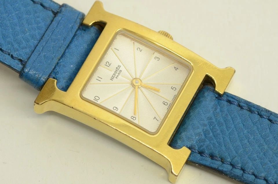 AUTHENTIC HERMES BLUE LEATHER GOLD PLATED H LOGO 29MM WATCH SUNBURST HH1.201: AUTHENTIC HERMES BLUE LEATHER GOLD PLATED H LOGO 29MM WATCH SUNBURST HH1.201 Authentic Hermes Blue Leather Gold Plated H Logo 29mm Watch Sunburst HH1.201 Authentic Hermes Blue Leather Gold Plated H Lo