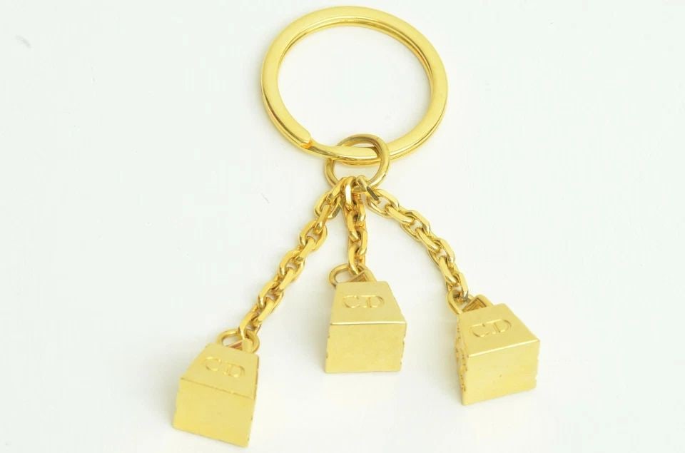 AUTHENTIC CHRISTIAN DIOR GOLD CD LOGO ANVIL WEIGHT TRIPLE CHARM KEYCHAIN RING (1 of 2)