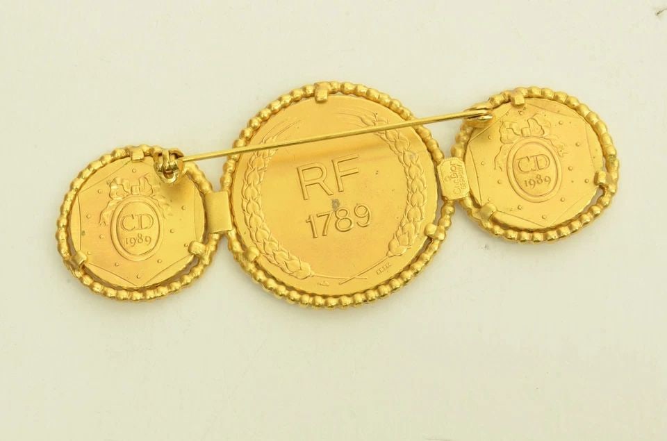 AUTHENTIC CHRISTIAN DIOR 3 COIN EMBLEM BROOCH RF1789 GP PIN JEWELRY ACCESSORY: AUTHENTIC CHRISTIAN DIOR 3 COIN EMBLEM BROOCH RF1789 GP PIN JEWELRY ACCESSORY Authentic Christian Dior 3 Coin Emblem Brooch RF1789 GP Pin Jewelry Accessory Authentic Christian Dior 3 Coin Emblem Brooc