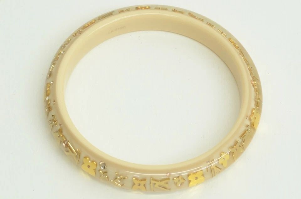 AUTHENTIC LOUIS VUITTON CREAM SLIP ON BRACELET MONOGRAM LOGO BANGLE JEWELRY: AUTHENTIC LOUIS VUITTON CREAM SLIP ON BRACELET MONOGRAM LOGO BANGLE JEWELRY Authentic Louis Vuitton Cream Slip On Bracelet Monogram Logo Bangle Jewelry AUTHENTIC LOUIS VUITTON CREAM SLIP ON BRACELET M