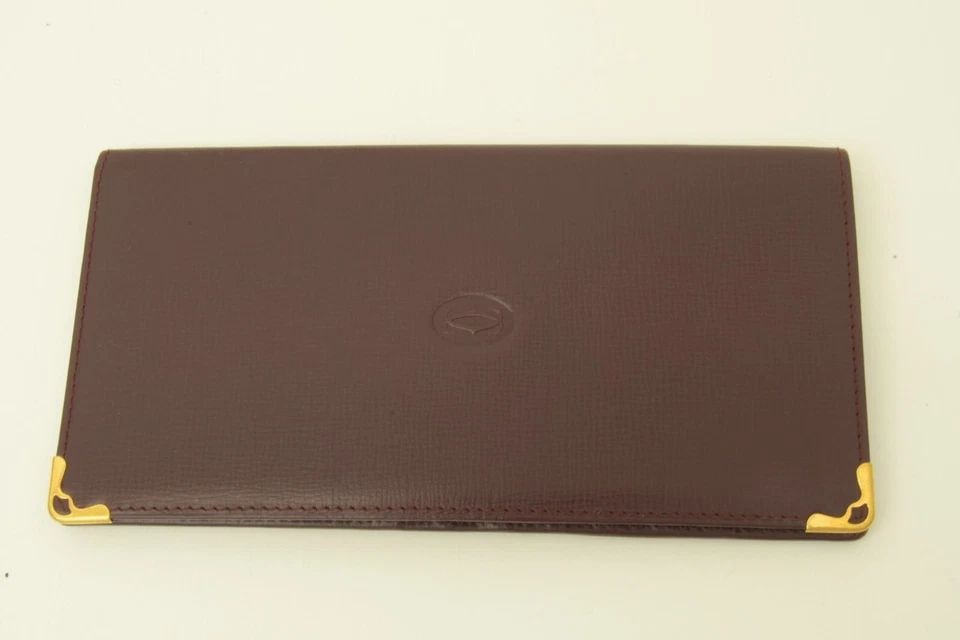 AUTHENTIC CARTIER BURGUNDY SLIM FOLD CLUTCH WALLET LEATHER DECOR LOGO GP CORNER: AUTHENTIC CARTIER BURGUNDY SLIM FOLD CLUTCH WALLET LEATHER DECOR LOGO GP CORNER Authentic Cartier Burgundy Slim Fold Clutch Wallet Leather Decor Logo GP Corner Authentic Cartier Burgundy Slim Fold Clu