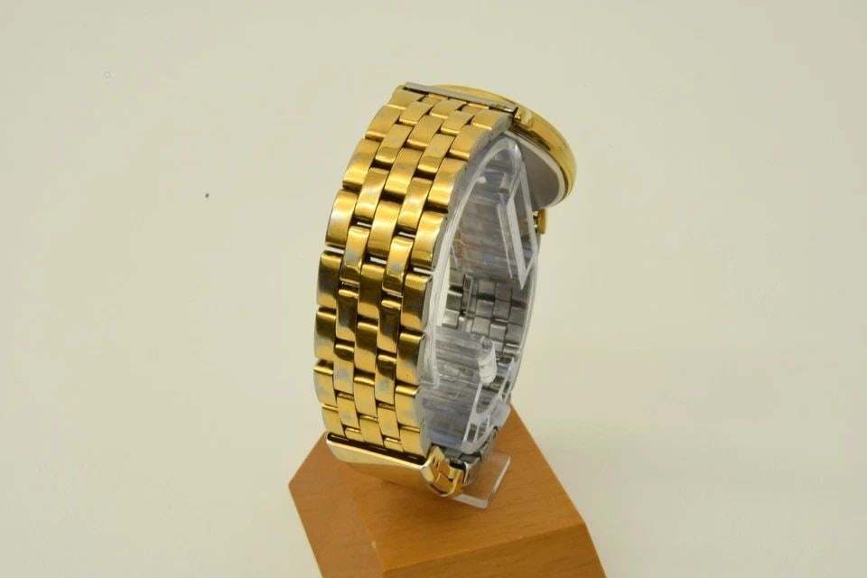 AUTHENTIC LONGINES GP WATCH 32MM QUARTZ VINTAGE GOLD SS LINKING BAND DATE: AUTHENTIC LONGINES GP WATCH 32MM QUARTZ VINTAGE GOLD SS LINKING BAND DATE Authentic Longines GP Watch 32mm Quartz Vintage Gold SS Linking Band Date Authentic Longines GP Watch 32mm Quartz Vintage Gold