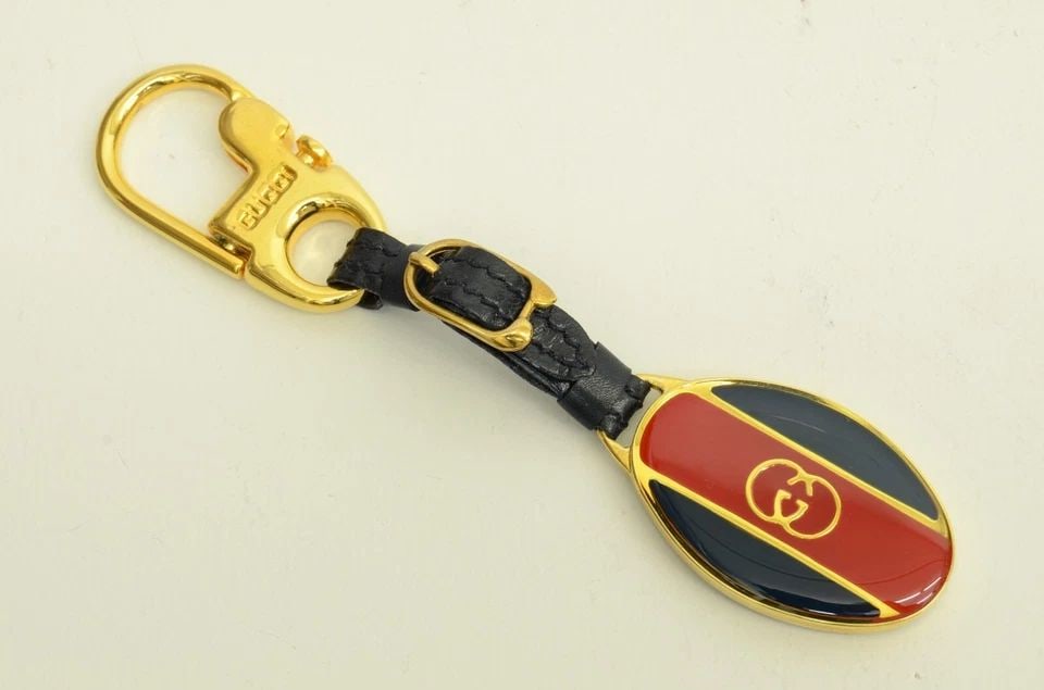 AUTHENTIC GUCCI RED STRIPE NAVY GG OVAL GP KEYCHAIN ACCESSORY LEATHER STRAP CLIP: AUTHENTIC GUCCI RED STRIPE NAVY GG OVAL GP KEYCHAIN ACCESSORY LEATHER STRAP CLIP Authentic Gucci Red Stripe Navy GG Oval GP Keychain Accessory Leather Strap Clip Authentic Gucci Red Stripe Navy GG Ova