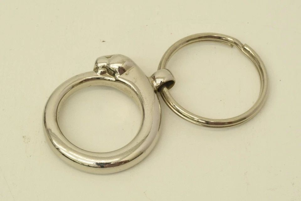 AUTHENTIC CARTIER PANTAIL CLASSIC SILVER PLATED LOGO KEYCHAIN ACCESSORY CHARM 2: AUTHENTIC CARTIER PANTAIL CLASSIC SILVER PLATED LOGO KEYCHAIN ACCESSORY CHARM 2 Authentic Cartier Pantail Classic Silver Plated Logo Keychain Accessory Charm 2 Authentic Cartier Pantail Classic Silver