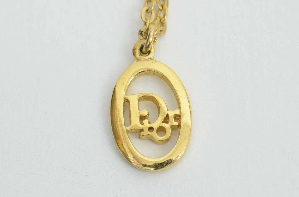AUTHENTIC CHRISTIAN DIOR NECKLACE VERTICAL OVAL SIGNATURE GP CHARM CHAIN JEWELRY: AUTHENTIC CHRISTIAN DIOR NECKLACE VERTICAL OVAL SIGNATURE GP CHARM CHAIN JEWELRY Authentic Christian Dior Necklace Vertical Oval Signature GP Charm Chain Jewelry AUTHENTIC CHRISTIAN DIOR NECKLACE VERT