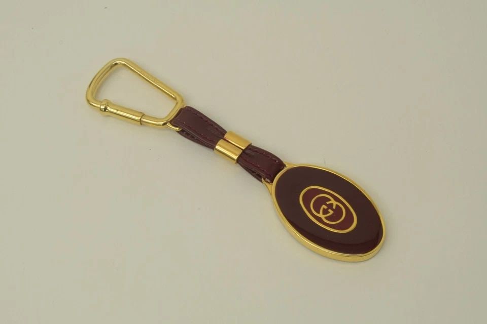 AUTHENTIC GUCCI GOLD PLATED GG OVAL KEYCHAIN JEWELRY ACCESSORY GP CLIP RED/BROWN: AUTHENTIC GUCCI GOLD PLATED GG OVAL KEYCHAIN JEWELRY ACCESSORY GP CLIP RED/BROWN Authentic Gucci Gold Plated GG Oval Keychain Jewelry Accessory GP Clip Red/Brown Authentic Gucci Gold Plated GG Oval Ke