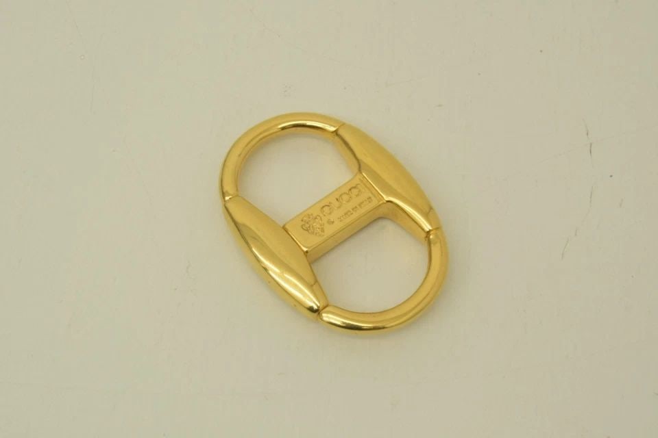 AUTHENTIC GUCCI TWIST DOUBLE LOOP GOLD PLATED CHARM WEIGHT KEYCHAIN JEWELRY (1 of 2)