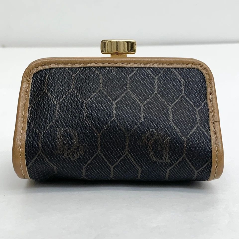 AUTHENTIC CHRISTIAN DIOR VINTAGE LEATHER COIN CASE BLACK TAN GOLD PLATED CLIP: AUTHENTIC CHRISTIAN DIOR VINTAGE LEATHER COIN CASE BLACK TAN GOLD PLATED CLIP Christian Dior Clip Closure Width: 9.5 cm Height: 6.0 cm Depth: 5.5 cm Black, Tan, Gold Gold Plated, Leather, Canvas Manuf