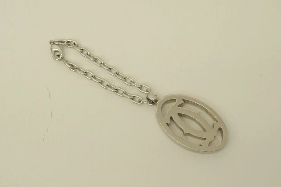 AUTHENTIC CARTIER DECOR LOGO CLASSIC SILVER KEYCHAIN SWISS MADE SIGNATURE CHARM: AUTHENTIC CARTIER DECOR LOGO CLASSIC SILVER KEYCHAIN SWISS MADE SIGNATURE CHARM Authentic Cartier Decor Logo Classic Silver Keychain Swiss Made Signature Charm Authentic Cartier Decor Logo Classic Sil