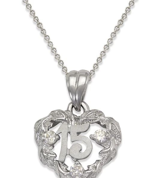 NEW 14K WHITE GOLD 15 ANOS PENDANT: NEW 14K WHITE GOLD 15 ANOS PENDANT 15 ANOS PENDANT NEW 14K WHITE GOLD Apx. WIDTH: 15x19mm Apx WEIGHT: 2.0g