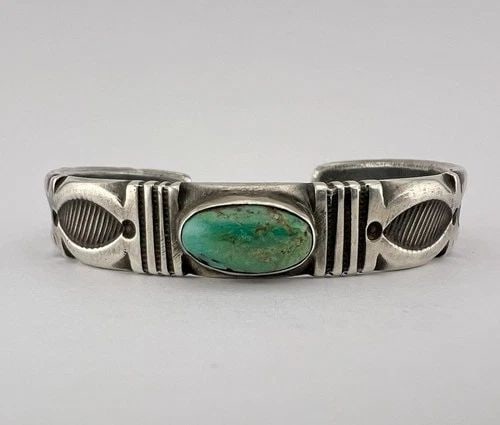 VTG JOCK FAVOUR INGOT COIN SILVER CERRILLOS TURQUOISE CHISELED CUFF BRACELET #4: Jock Favour Ingot Coin Silver Chiseled Cerrillos Turquoise Cuff Bracelet #4 Cuff Size is 5 1/8" tip to Tip and has an 7/8" Wide Gap Cuff Is Just Under 1/2" Wide In The Center Weight is 40.0 Grams on m