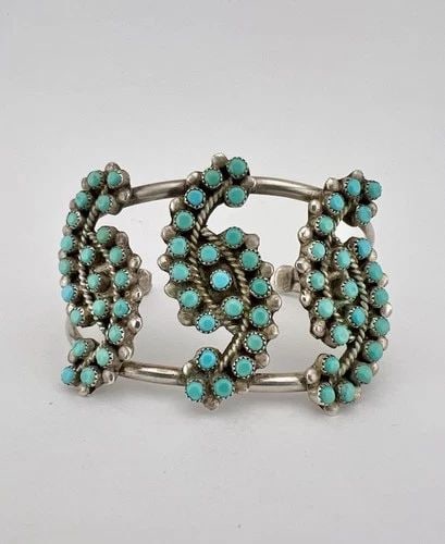 RARE VINTAGE ZUNI STERLING SILVER TURQUOISE SNAKE EYE SWIRLS CUFF BRACELET: RARE Vintage Zuni Sterling Silver Turquoise Snake Eye SWIRLS Cuff Bracelet Cuff is 5" tip to Tip and has a Just Under 1 1/4" Wide - Adjustable Gap Cuff Is 1 3/4" Wide In The Center Weight is 30.5 Gram