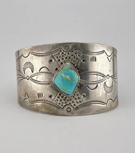 VTG FRED HARVEY ERA NAVAJO COIN SILVER TURQUOISE STAMPED WIDE CUFF BRACELET: VTG FRED HARVEY ERA NAVAJO COIN SILVER TURQUOISE STAMPED WIDE CUFF BRACELET Vtg Fred Harvey Era Navajo Coin Silver Turquoise Stamped Wide Cuff Bracelet Cuff is 5 1/2" tip to Tip and has a 1 1/2" Wide 