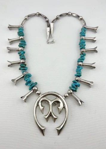 VTG 27" NAVAJO STERLING SILVER HEISHI TURQUOISE SQUASH BLOSSOM NECKLACE 120.5G: VTG 27" NAVAJO STERLING SILVER HEISHI TURQUOISE SQUASH BLOSSOM NECKLACE 120.5G Vtg 27" Navajo Sterling Silver Heishi Turquoise Squash Blossom Necklace 120.5g This Amazing necklace features Natural spe