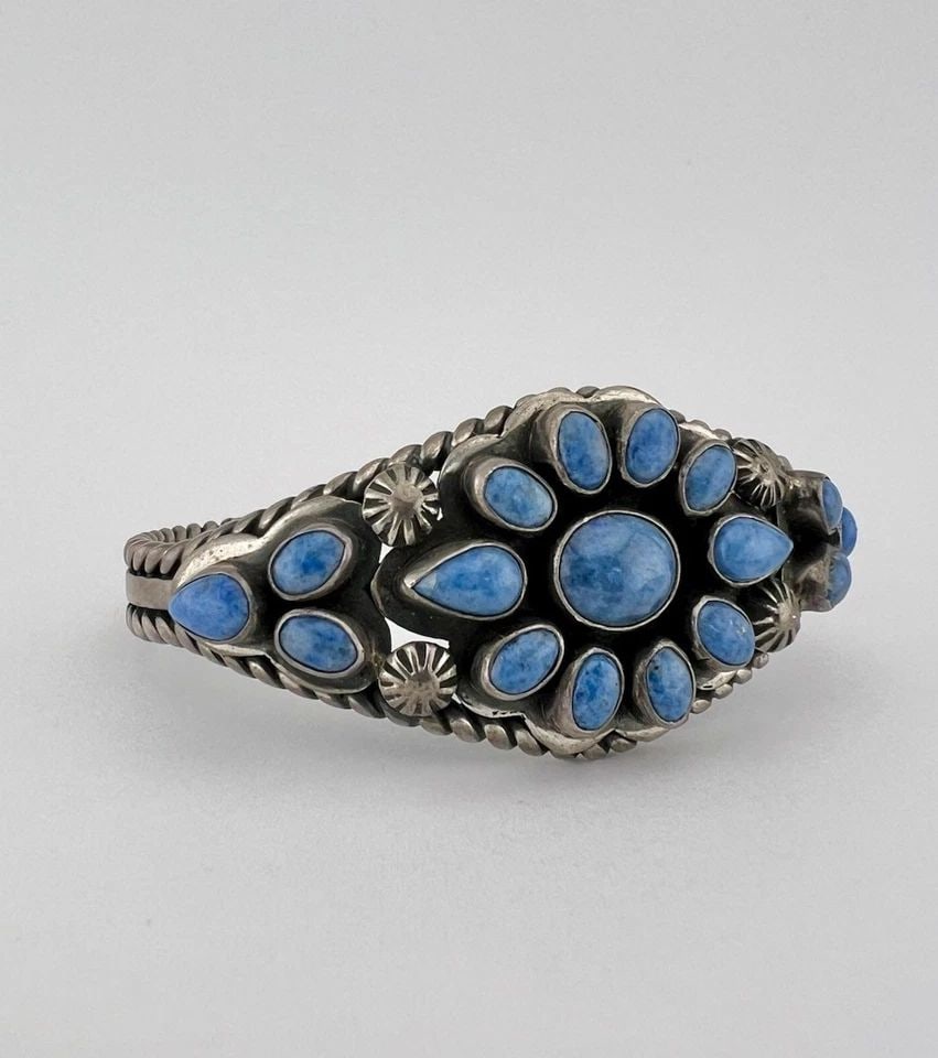 VTG NAVAJO STERLING SILVER DENIM BLUE LAPIS LAZULI TWIST CLUSTER CUFF BRACELET: VTG NAVAJO STERLING SILVER DENIM BLUE LAPIS LAZULI TWIST CLUSTER CUFF BRACELET Vtg Navajo Sterling Silver Natural Denim Lapis Lazuli Twist Cluster Cuff Bracelet Cuff is Around 5 1/4" tip to Tip and ha