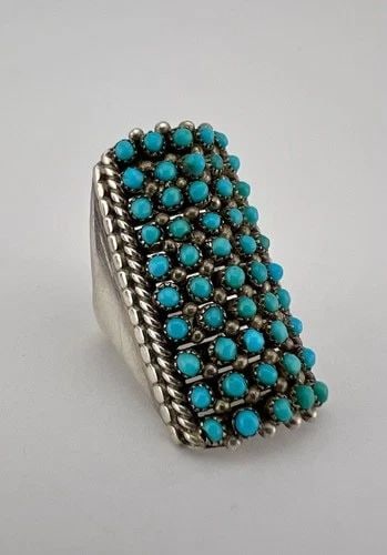 VTG RJL ZUNI STERLING SILVER PETIT POINT SNAKE EYE TURQUOISE 10 ROW WOMEN'S RING: Vtg RJL Zuni Sterling Silver Petit Point Snake Eye Turquoise 10 Row Women's Ring Ring Size - 5.5 Weight is 9.4 Grams on my scale Metal: Sterling Silver Ring is 1 1/4" Tall In the Center Amazing 10 Row