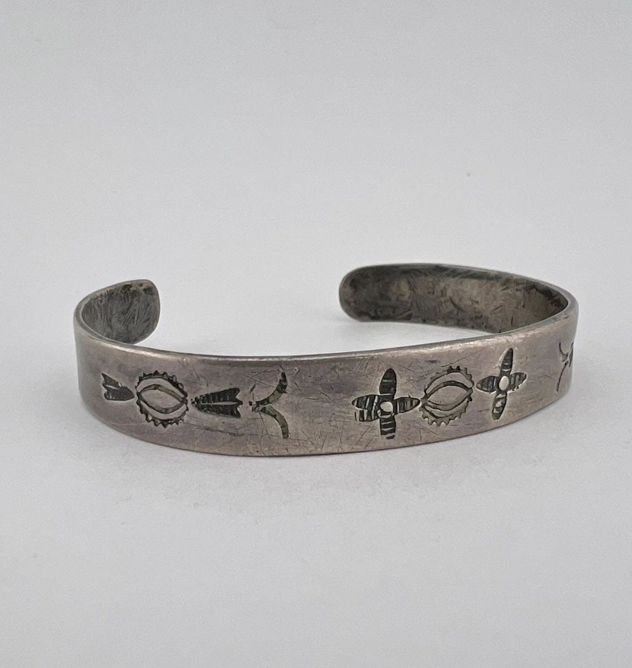 OLD PAWN 1930'S FRED HARVEY NAVAJO COIN SILVER HAND STAMPED CUFF BRACELET: OLD Pawn 1930's Fred Harvey Navajo Coin Silver Hand Stamped Cuff Bracelet Cuff is 4 7/8" tip to Tip and has an a Around 1 1/8" Wide Adjustable Gap (Small Size) Cuff Is 3/8" Wide in the Center Weight i