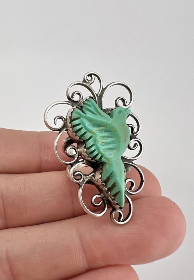 VINTAGE NAVAJO STERLING SILVER CARVED TURQUOISE FLYING EAGLE / BIRD WOMEN'S RING: Vintage Navajo Sterling Silver Carved Turquoise Flying Eagle / Bird Women's Ring Ring Size: 6.75 - Can Be Resized Weight is 10.4 Grams on my scale Metal: Sterling Silver Ring is 1 5/8" Tall In the Cen