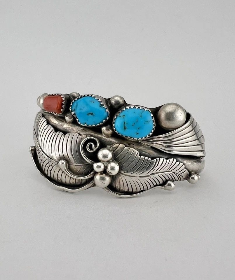 VTG PHIL CHAPO NAVAJO STERLING SILVER TURQUOISE & CORAL DETAILED CUFF BRACELET: VTG Phil Chapo Navajo Sterling Silver Turquoise & Coral Detailed Cuff Bracelet Cuff is Around 5 1/4" tip to Tip and has a 1 1/4" Wide Adjustable Gap Cuff Is Over 1 1/4" Wide At its Wideset Point Weigh