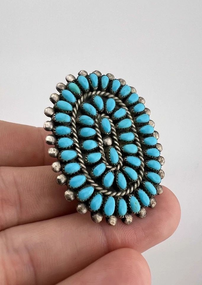 PHILLIP VIRGINIA BYJOE NAVAJO STERLING SILVER PETIT POINT TURQUOISE CLUSTER RING: Vtg Phillip & Virginia Byjoe Navajo Sterling Silver Petit Point Turquoise Cluster Ring Ring Size: 8 - Can Be re Sized Weight is 15.3 Grams on my scale Metal: Sterling Silver Ring is 1 7/8" Tall In the