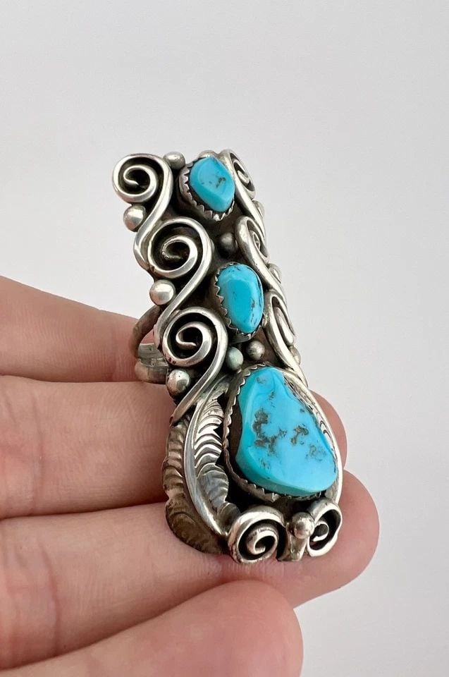 HUGE 2.25" VTG NAVAJO STERLING SILVER SLEEPING BEAUTY TURQUOISE STAMPED RING 21G: HUGE 2.25" Vtg Navajo Sterling Silver Sleeping Beauty Turquoise Stamped Ring 21g Ring Size: 6.75- Can Be Resized Weight is 21.0 Grams on my scale Test Positive For Sterling Silver Ring is 2 1/4" Tall 