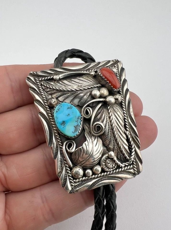 VTG NAVAJO STERLING SILVER KINGMAN TURQUOISE & RED CORAL STAMPED BOLO TIE 2 1/8": Vtg Navajo Sterling Silver Kingman Turquoise & Red Coral Stamped Bolo Tie 2 1/8" Size: 2 1/8" Tall by Just Under 2" Wide at The Top Weight is 44.3 Grams on my scale Metal: Sterling Silver Amazing Natu