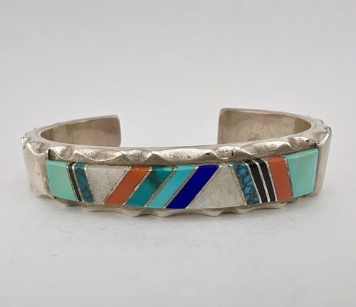VTG RICK TOLINO NAVAJO STERLING SILVER MULTI GEMSTONE FLUSH INLAY CUFF BRACELET: VTG RICK TOLINO NAVAJO STERLING SILVER MULTI GEMSTONE FLUSH INLAY CUFF BRACELET Vtg Rick Tolino Navajo Sterling Silver Multi Gemstone Flush Inlay Cuff Bracelet Cuff is 5 1/8" tip to Tip and has a 1 1/
