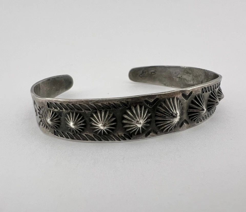 EARLY FRED HARVEY ERA NAVAJO SILVER REPOUSSE SPIKE STAMPED ARROW CUFF BRACELET: EARLY FRED HARVEY ERA NAVAJO SILVER REPOUSSE SPIKE STAMPED ARROW CUFF BRACELET Early Fred Harvey Era Navajo Silver REPOUSSE Spike Stamped Arrow Cuff Bracelet Cuff is Under 5 1/2" tip to Tip and has Ju