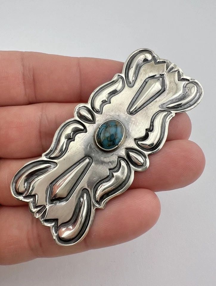 VTG NAVAJO STERLING SILVER CANDELARIA TURQUOISE STAMPED CONCHO BROOCH PIN 2.75": VTG NAVAJO STERLING SILVER CANDELARIA TURQUOISE STAMPED CONCHO BROOCH PIN 2.75" Vtg Navajo Sterling Silver Candelaria Turquoise Stamped Concho Brooch Pin 2.75" Size: 1 1/4" Tall by 2 3/4" Wide Metal: 
