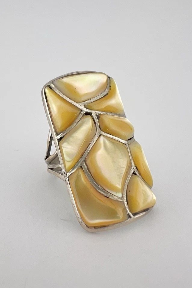 VTG ZUNI STERLING SILVER FISH SCALE YELLOW MOTHER OF PEARL 3D INLAY RING 1.5": HUGE 1.5" Vtg Zuni Sterling Silver Fish Scale Mother of Pearl 3D Flush Inlay Ring Ring Size: 10.25 Weight is 14.8 Grams on my scale Metal: Sterling Silver Ring is 1 1/2" Tall In the Center Amazing 3D 