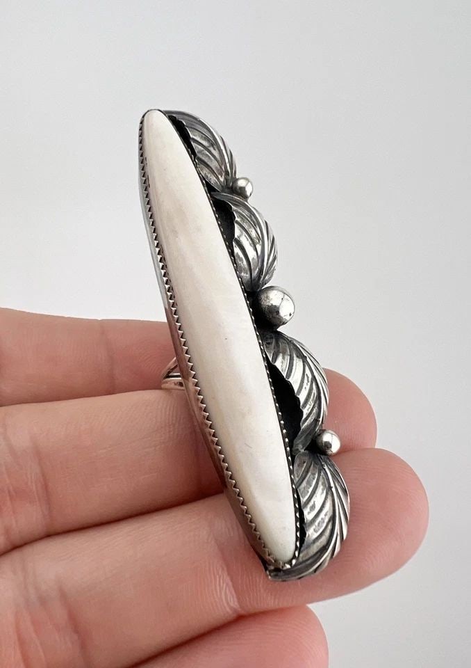 HUGE VINTAGE NAVAJO STERLING SILVER MOTHER OF PEARL STAMPED 2 1/2" LONG RING: HUGE Vintage Navajo Sterling Silver Mother Of Pearl Stamped 2 1/2" Long Ring Ring Size: 6.25 - Can Be Re Sized Weight is 14.8 Grams on my scale Metal: Sterling Silver Ring is 2 1/2" Tall In the Center