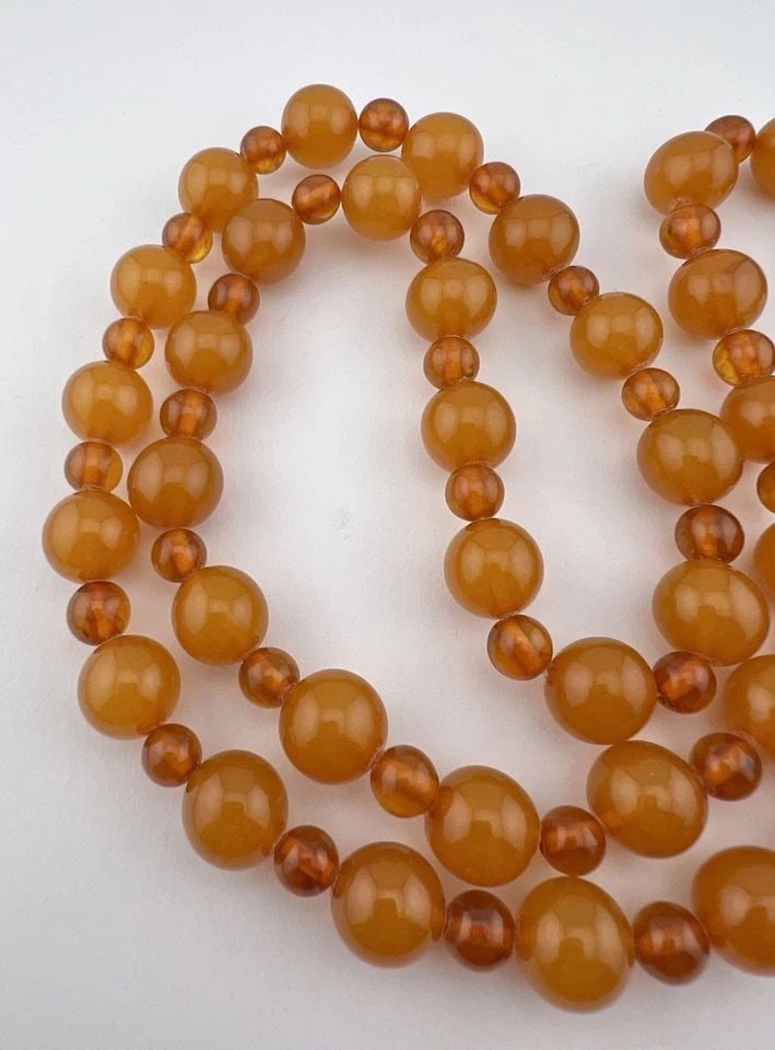 VINTAGE NATURAL BALTIC COGNAC HONEY AMBER ROUND BALL NECKLACE 32" - 64.8G: VINTAGE NATURAL BALTIC COGNAC HONEY AMBER ROUND BALL NECKLACE 32" - 64.8G Vintage Natural Baltic Cognac Honey Amber Round Ball Necklace 32" - 64.8g Size: 32" Long - No Clasp Weight is 64.8 Grams on my