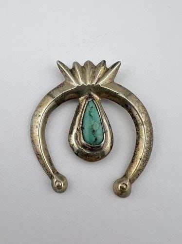 VINTAGE NAVAJO SANDCAST STERLING SILVER WEBBED TURQUOISE NAJA PENDANT 1 7/8": Vintage Navajo Sandcast Sterling Silver Webbed Turquoise NAJA Pendant 1 7/8" Size: 1 7/8" Tall By 1 5/8" Wide Metal: Sterling Silver Weight is 14.2 Grams on my scale Amazing Natural Spiderweb Turquois