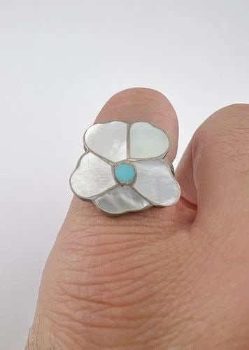 VINTAGE ANSELM & ROSITA WALLACE ZUNI SILVER MOTHER OF PEARL FLOWER WOMEN'S RING: Vintage Anselm & Rosita Wallace ZUNI Silver Mother of Pearl Flower Women's Ring Ring Size: 6.25 - Can Be resized Weight is 3.8 Grams on my scale Metal: Sterling Silver Ring is 3/4" Tall In the Center 