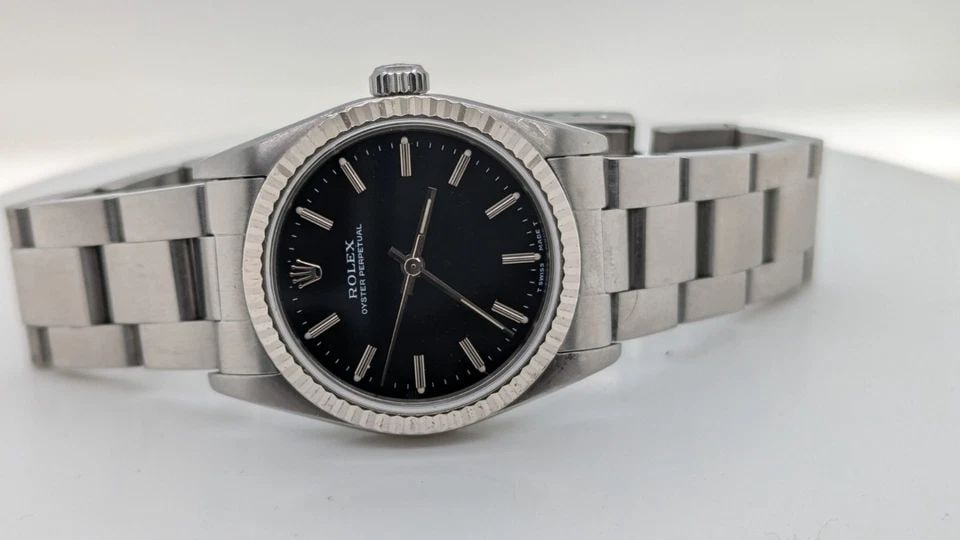 ROLEX OYSTER PERPETUAL 67480 STAINLESS STEEL BLACK DIAL AUTOMATIC WATCH - 31MM (1 of 2)