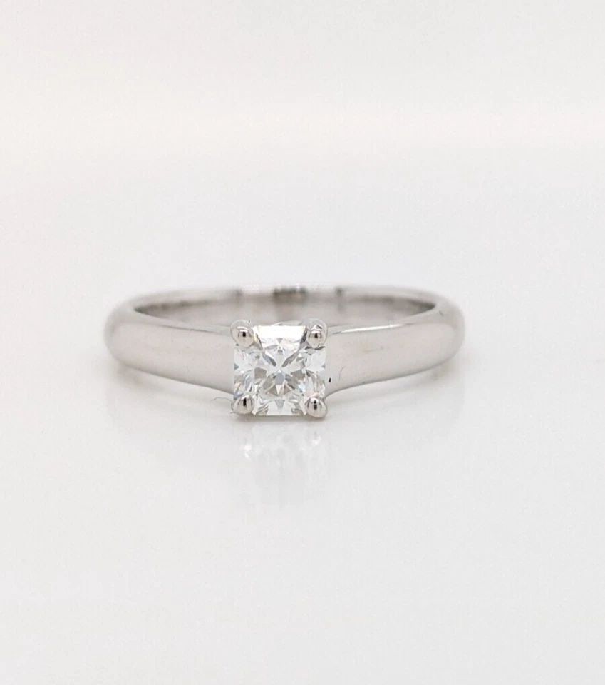 TIFFANY & CO. LUCIDA 0.38 CARAT DIAMOND SOLITAIRE PLATINUM - SIZE 4.25 W/RECEIPT: 1999 Tiffany & Co. Lucida 0.38 Carat Diamond Solitaire Platinum Ring Ring Size - 4.25 ( Resizable) Band Width - 2.5mm Color - E Clarity - VS2 Total Weight - 4.1 grams Excellent Condition Purchase Date