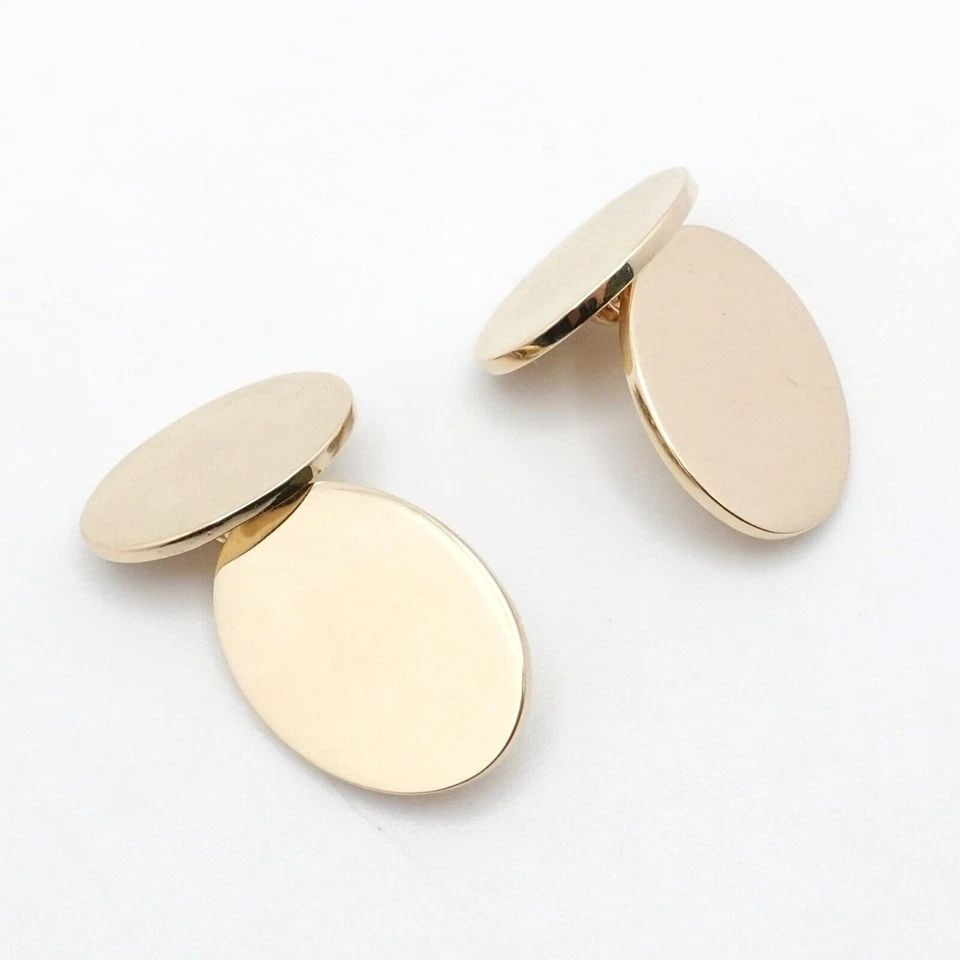 TIFFANY & CO. 14K YELLOW GOLD OVAL CHAIN LINK CUFFLINKS - ETCHED: Vintage Tiffany & Co. 14K Yellow Gold Oval Chain Link Cufflinks Fits Through 12mm Wide Button Height - 20mm (3/4") Width - 14mm Depth - 1mm approx. Total Weight - 14.9 Grams ** Light Etching on the ba