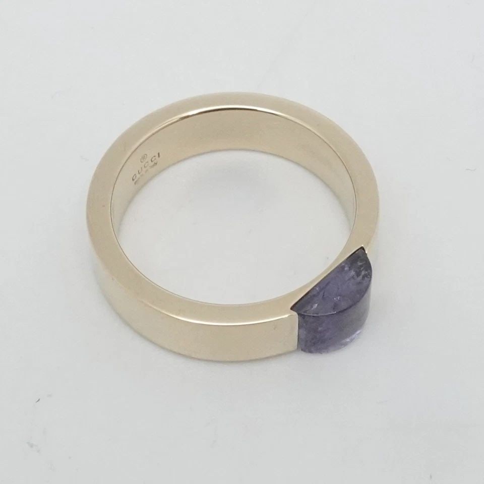GUCCI 18K YELLOW GOLD PURPLE GEMSTONE WIDE BAND RING SIZE 6.75: GUCCI 18K YELLOW GOLD PURPLE GEMSTONE WIDE BAND RING SIZE 6.75 GUCCI 18K Yellow Gold Purple Gemstone Wide Band Ring Size 6.75 Band Width - 5mm Band Depth - 2mm Thick Total Weight - 7.9 Grams No Box & 