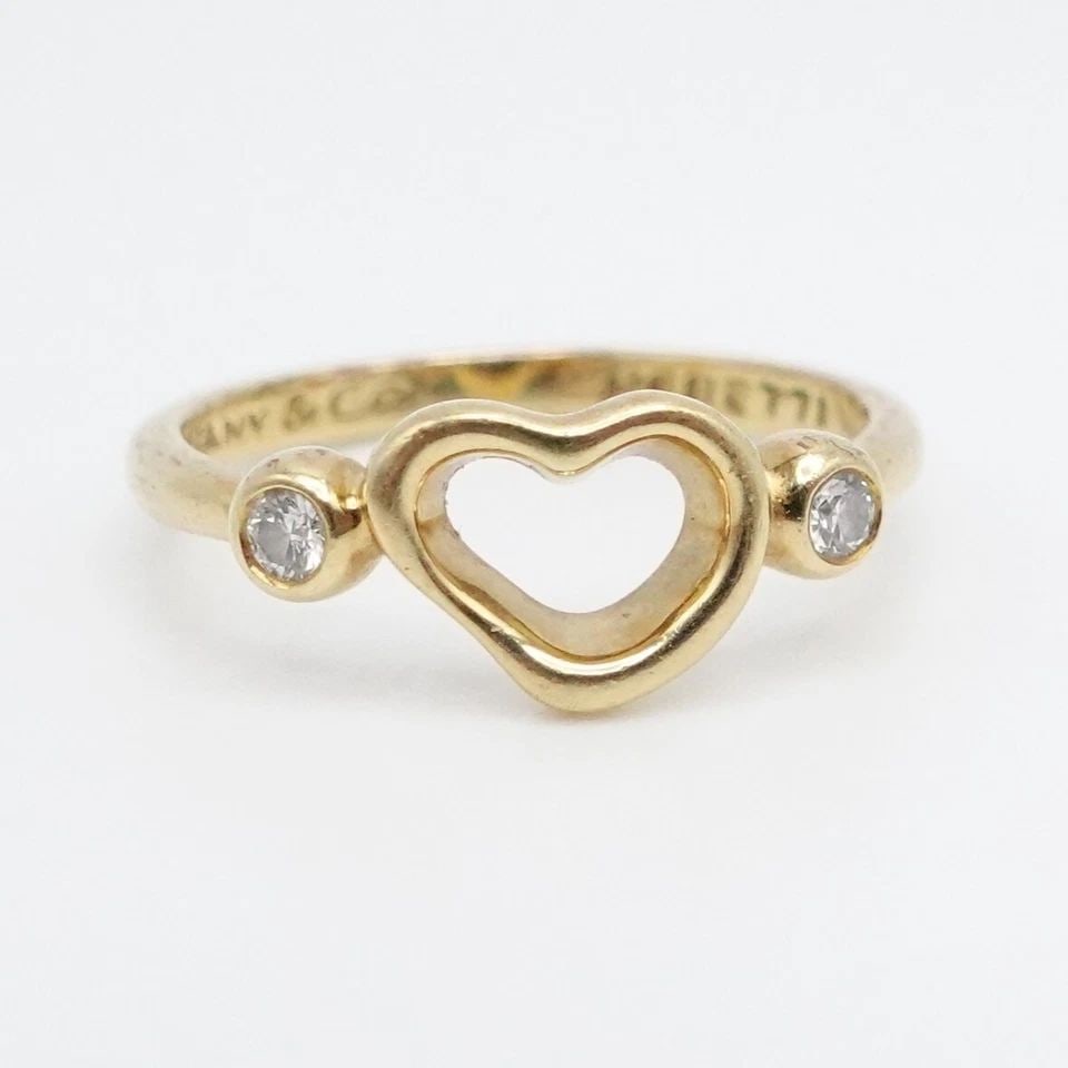 TIFFANY & CO. ELSA PERETTI 18K YELLOW GOLD OPEN HEART DIAMOND RING SIZE 5.25: Tiffany & Co. Elsa Peretti 18K Yellow Gold Open Heart Diamond Ring Size - 5.25 Band Width - 2mm Total Weight - 2.3 Grams Pouch NOT Included