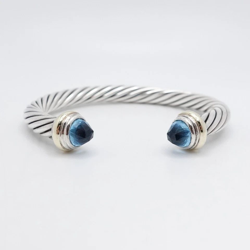DAVID YURMAN STERLING SILVER 14K GOLD BLUE TOPAZ 7MM CABLE CUFF MEDIUM BRACELET: DAVID YURMAN STERLING SILVER 14K GOLD BLUE TOPAZ 7MM CLASSIC CABLE BRACELET David Yurman Sterling Silver & 14K Yellow Gold Blue Topaz Classic Cable Medium Ladies' Cuff Bracelet Fits up to 6 - 6.5" Wri