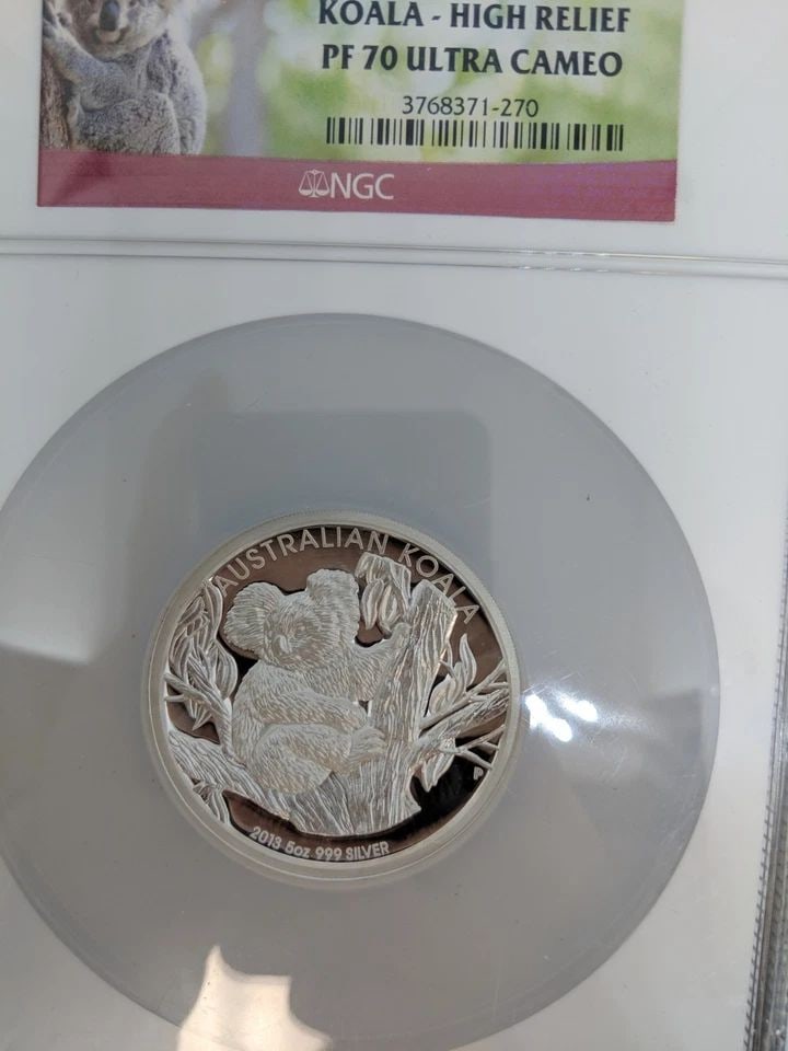 2013-P AUSTRALIA KOALA HIGH RELIEF SILVER $8 NGC PF 70 ULTRA CAMEO: 2013-P AUSTRALIA KOALA HIGH RELIEF 5 OZ. Silver $8 NGC - PF 70 ULTRA CAMEO Excellent Condition & Well Kept