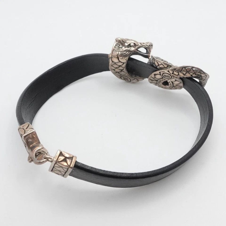 JOHN HARDY STERLING SILVER NAGA DRAGON LEATHER BRACELET 7" LONG: John Hardy Sterling Silver Naga Dragon Leather Bracelet Length - 7" Long Fits up to Relax 6.5"- 6.75" Snug Wrist Leather Width - 9.5mm Dragon Motif Size - 3/4" x 1.50" Total Weight - 17.3 Grams Hallma