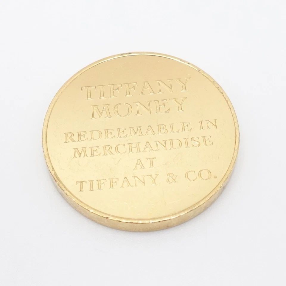 TIFFANY & CO. $100 GOLD PLATED TIFFANY MONEY COIN TOKEN #Q2: Tiffany & Co. $100 One Hundred Dollar Gold Plated Tiffany Money Coin Token #Q2 No Pouch or Box is Included.