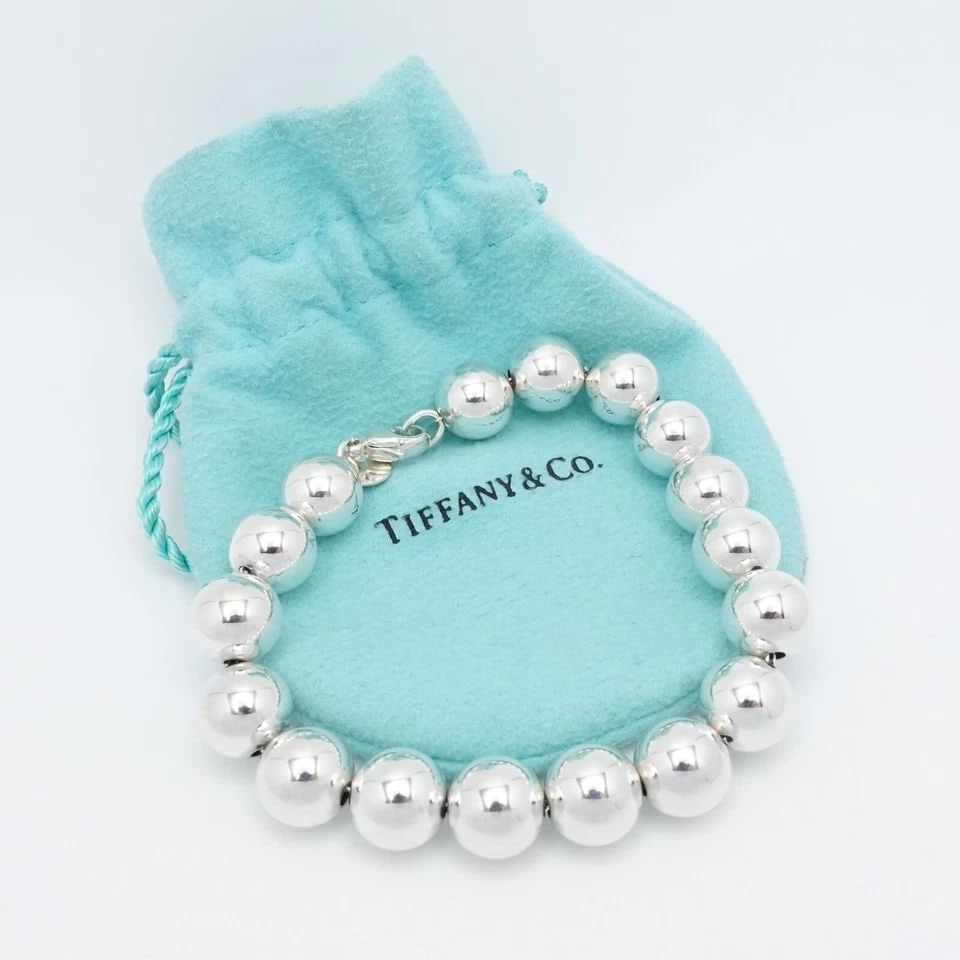 TIFFANY & CO. HARDWEAR STERLING SILVER BALL BRACELET - SIZE 7.25" LONG POUCH #Q1: Tiffany & Co. HardWear Sterling Silver Ball Bracelet #Q1 Size - 7.25" Long Wrist Size - Relax 6" - 6.25" Snug Fit Chain Width - 10mm Est. Retail Price - $675 USD Total Weight - 19.1 Grams Very Great &
