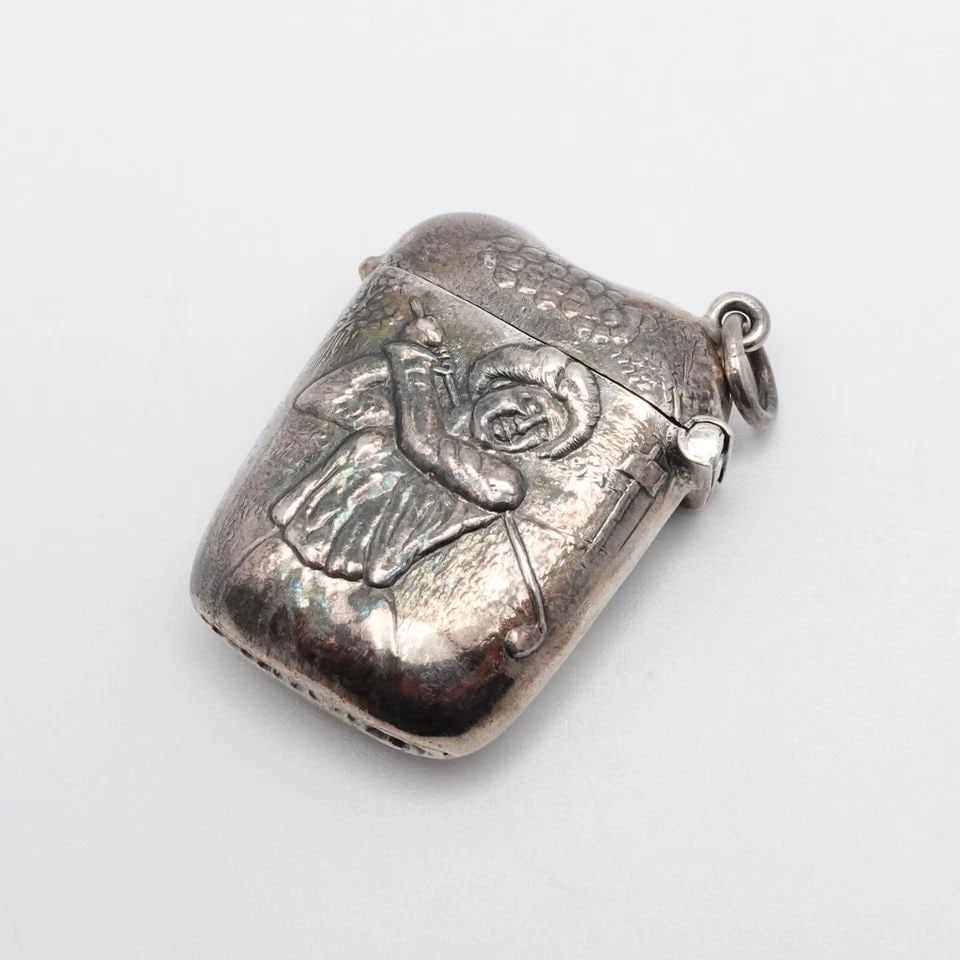 STERLING SILVER LADY GOLFER VESTA MATCH CASE HOLDER - 1.5" X 1.25": STERLING SILVER LADY GOLFER VESTA MATCH CASE HOLDER - 1.5" X 1.25" Vintage Sterling Silver Lady Golfer Vesta Match Case Holder Size - 1.5" x 1.25" Width - 11mm Bail Width - 5.5mm Total Weight - 17.6 G