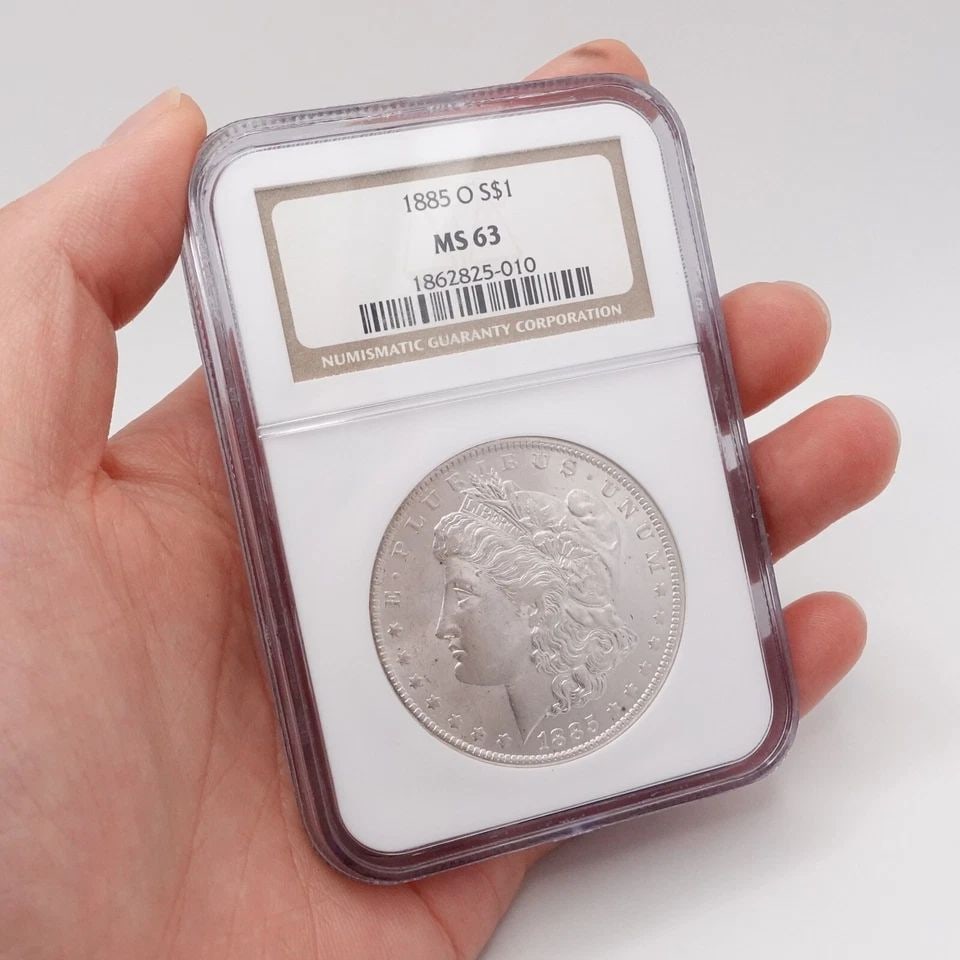 1885 O MORGAN SILVER DOLLAR COIN - NGC MS 63: 1885 O Morgan Silver Dollar NGC Certified MS 63 Est. Price Value - $110 USD