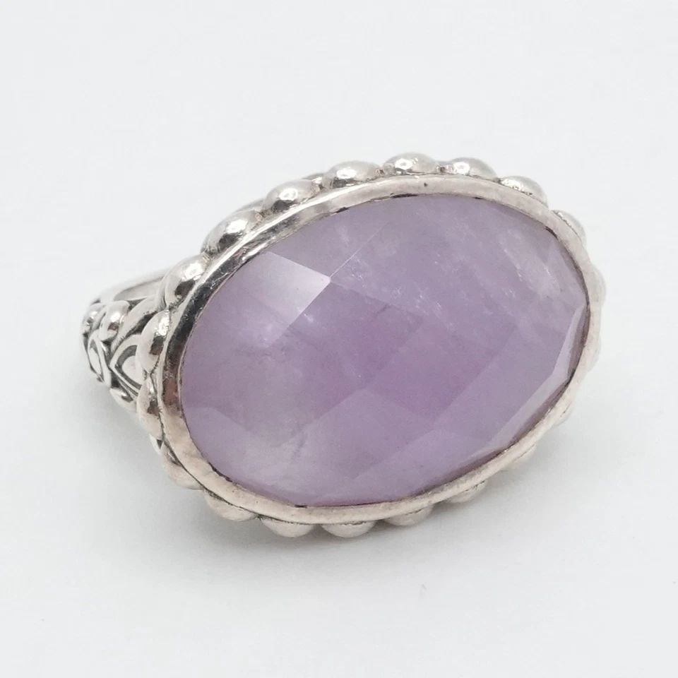 JAI JOHN HARDY OVAL FACETED LAVENDER AMETHYST HEART DOME RING SIZE 6.25: JAI JOHN HARDY OVAL FACETED LAVENDER AMETHYST HEART DOME RING SIZE 6.25 JAi by John Hardy Oval Faceted Lavender Amethyst Heart Dome Ring Size - 6.25 Band Width - 2mm Gemstone Size (LxW) - 14mm x 19mm 