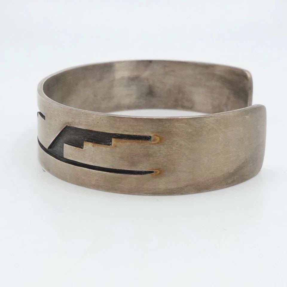 STERLING SILVER NAVAJO CUFF BRACELET 6.75" WRIST: STERLING SILVER NAVAJO CUFF BRACELET 6.75" WRIST Sterling Silver Navajo Cuff Bracelet Fits up to 6.75" Wrist Cuff Width - 13mm Diameter - 59mm Total Weight - 20.5 Grams